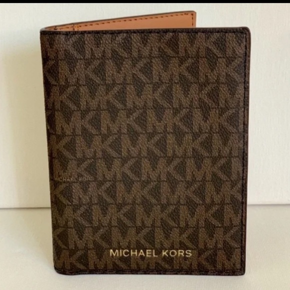 Michael Kors Handbags - Michael Kors, passport wallet. Like new never used. Dark brown tan logoed.